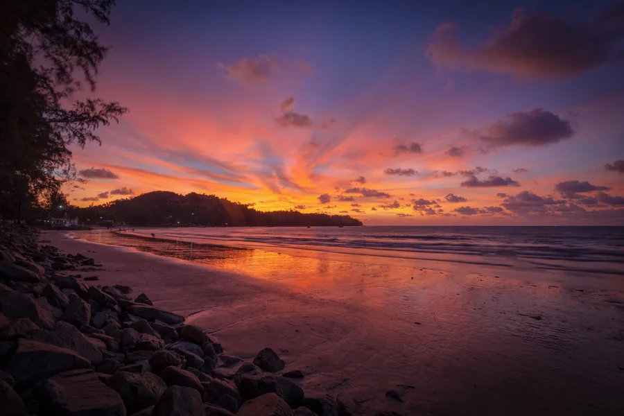 Sunset over Bang Tao — Bang Tao Beach, Phuket · The Title Cocoon