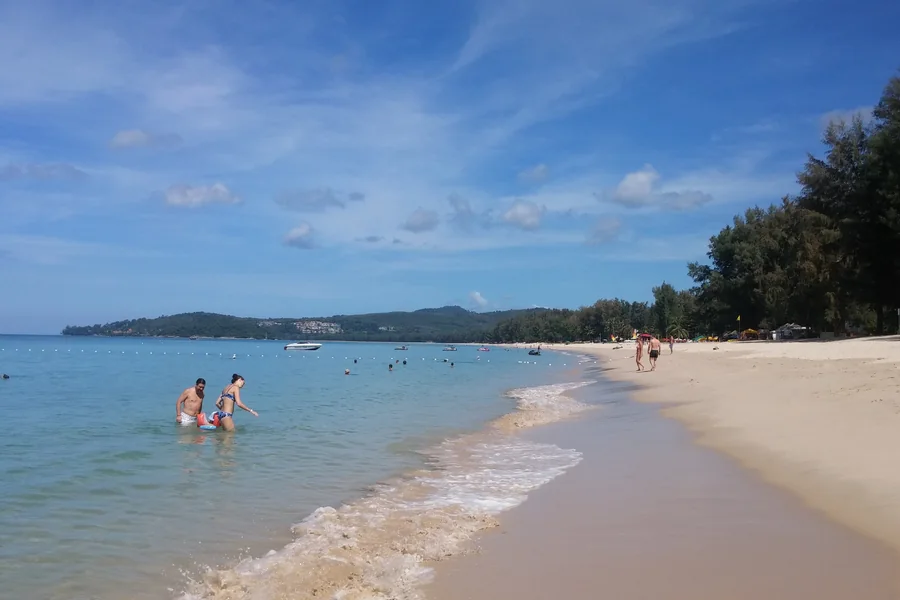 The turquoise water of Bang Tao — Bang Tao Beach, Phuket · The Title Cocoon