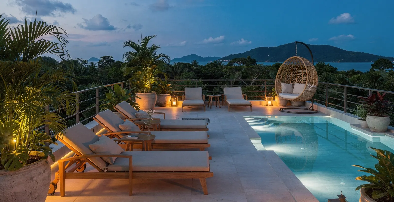 The Title Cocoon — A pool terrace at dusk