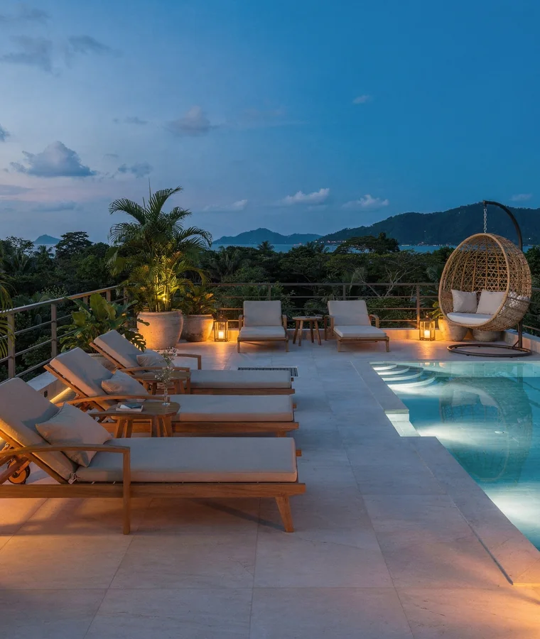 The Title Cocoon Bang Tao — A pool terrace at dusk